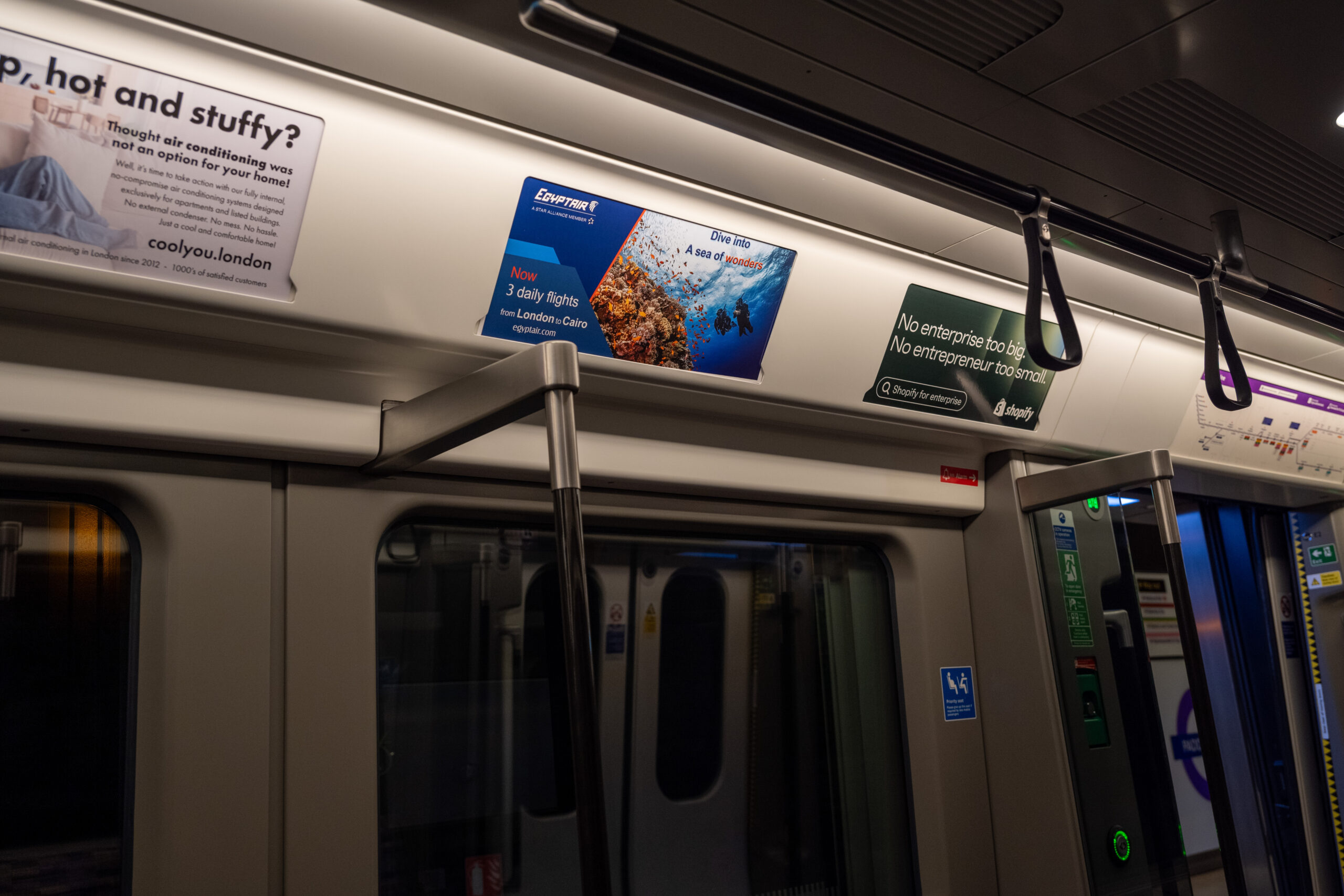 Example of Tube Car Panel advertising on the London Underground.