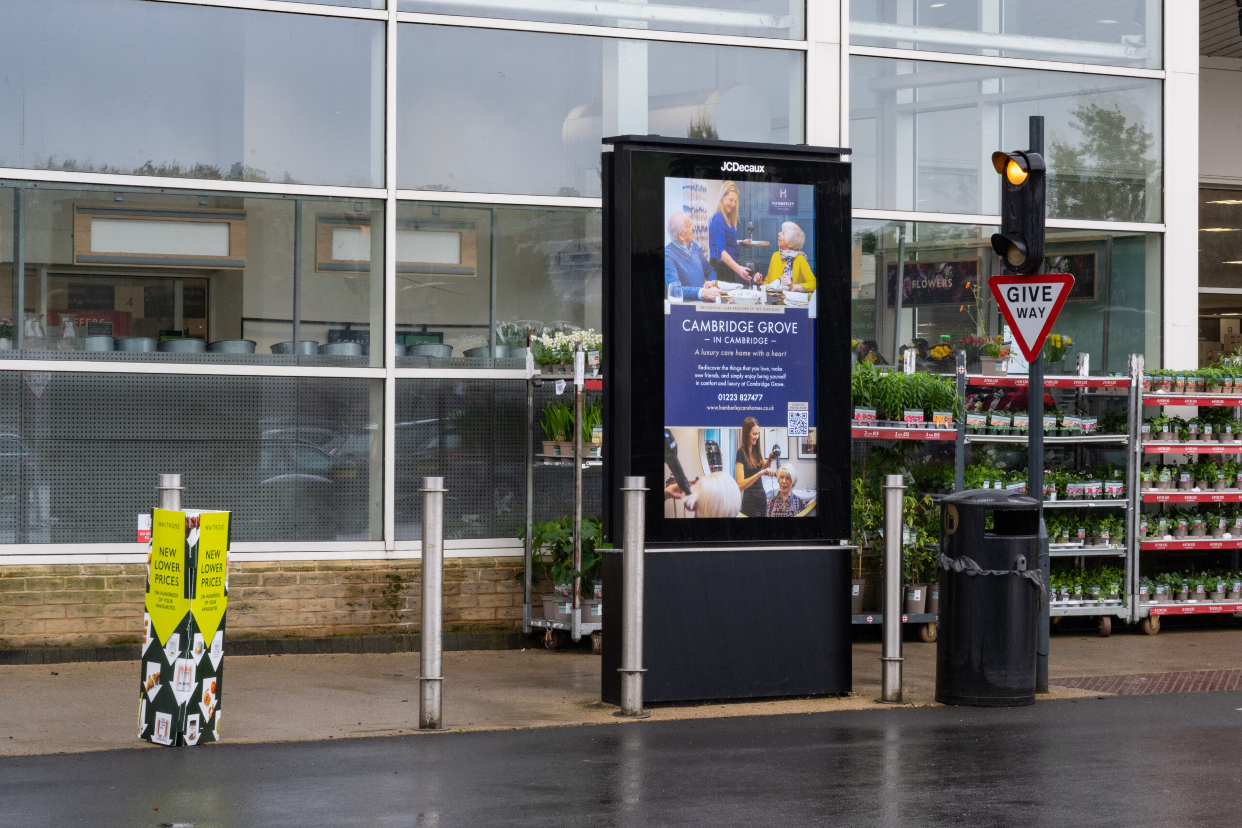 Example of digital screen advertising outside Waitrose supermarkets.