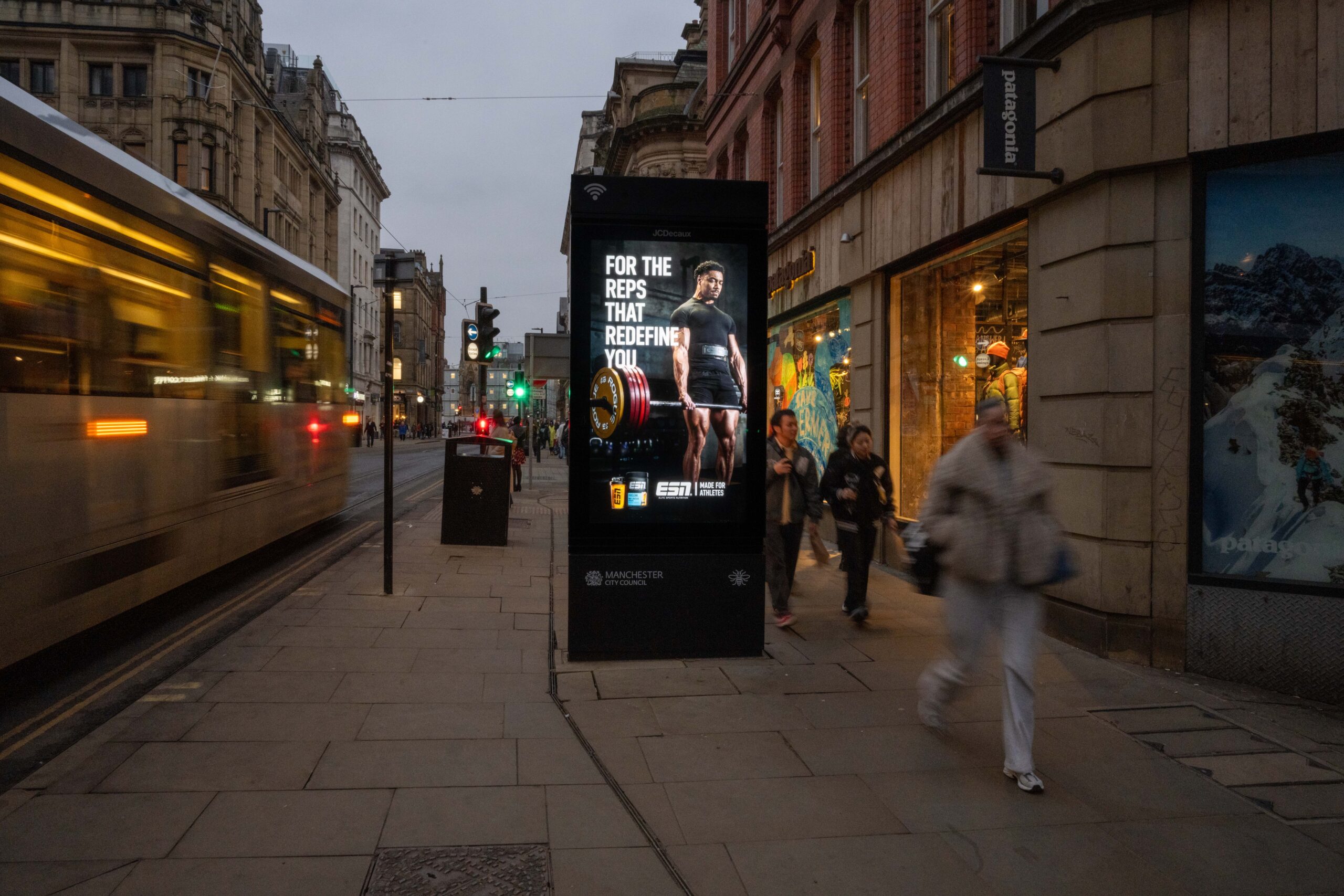 An example of a digital 6-sheet advert in Manchester featuring protein brand ESN.